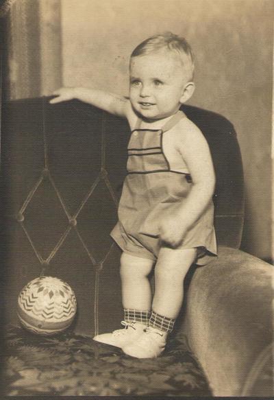 Pike County, Indiana, Unidentified Children, Young Boy Standing on Chair with Ball