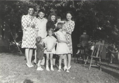 Group of children standing together outdoors