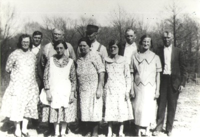 Group of elderly men and women standing together outdoors