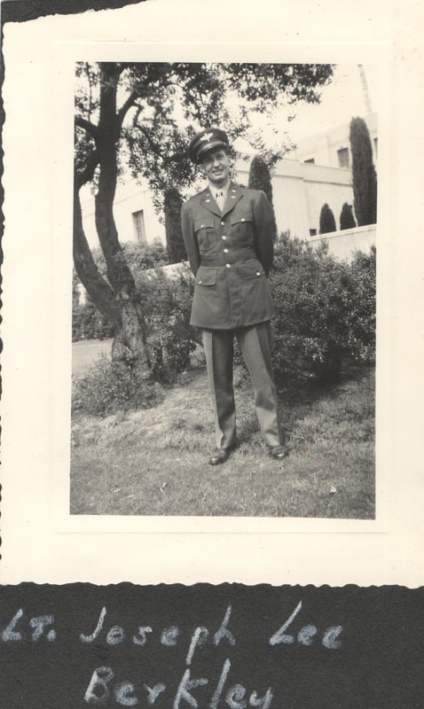 Soldier in uniform standing with hands behind back
