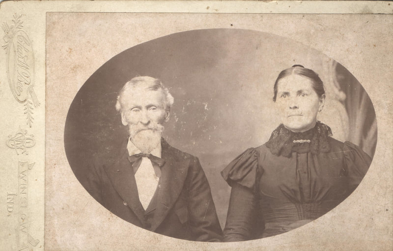 Elderly man and woman in dress clothes