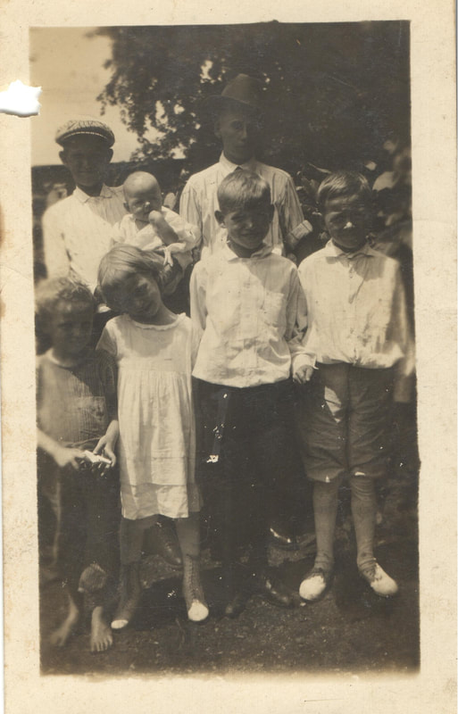 Group of children standing together outside