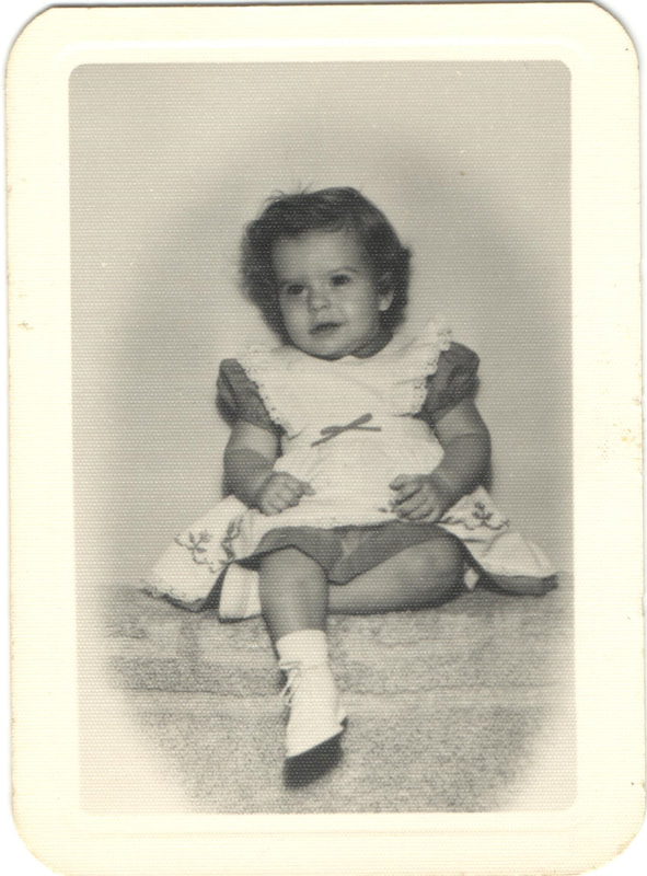 Baby girl in pattern dress