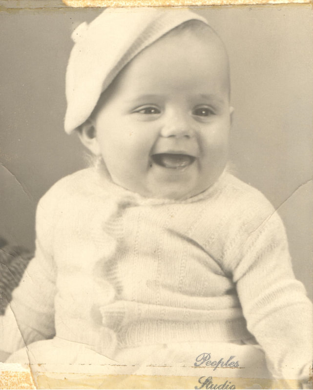 Smiling baby girl with beret