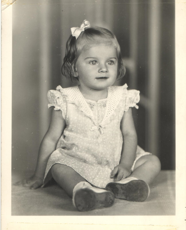 Young girl with bow in hair 