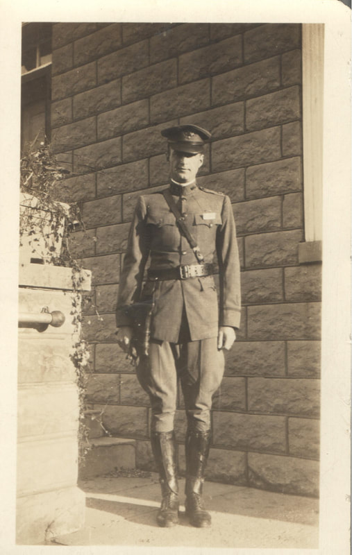 Soldier standing in full military uniform 