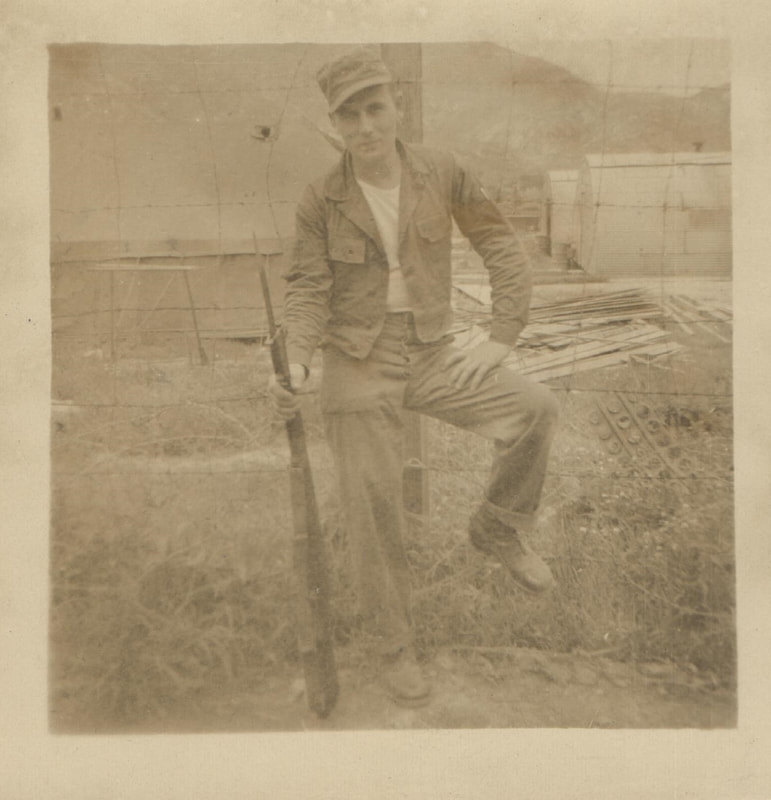 Pike County, Indiana, Ernie Grimes Collection, Soldier Standing against Fence with Rifle