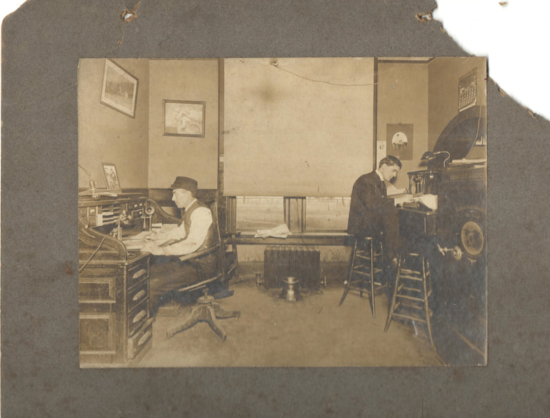 Pike County, Indiana, Harrison Family, Two Men Seated in Office, Parks Harrison at Stockyard, 1907