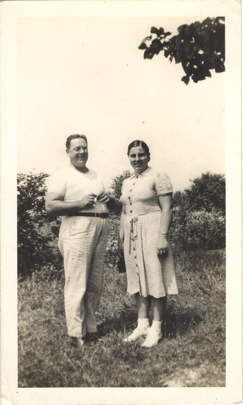 Man and woman standing outdoors