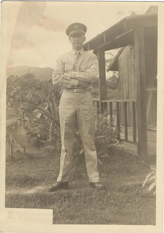 United States Army, Soldier standing with arms folded in tropical country