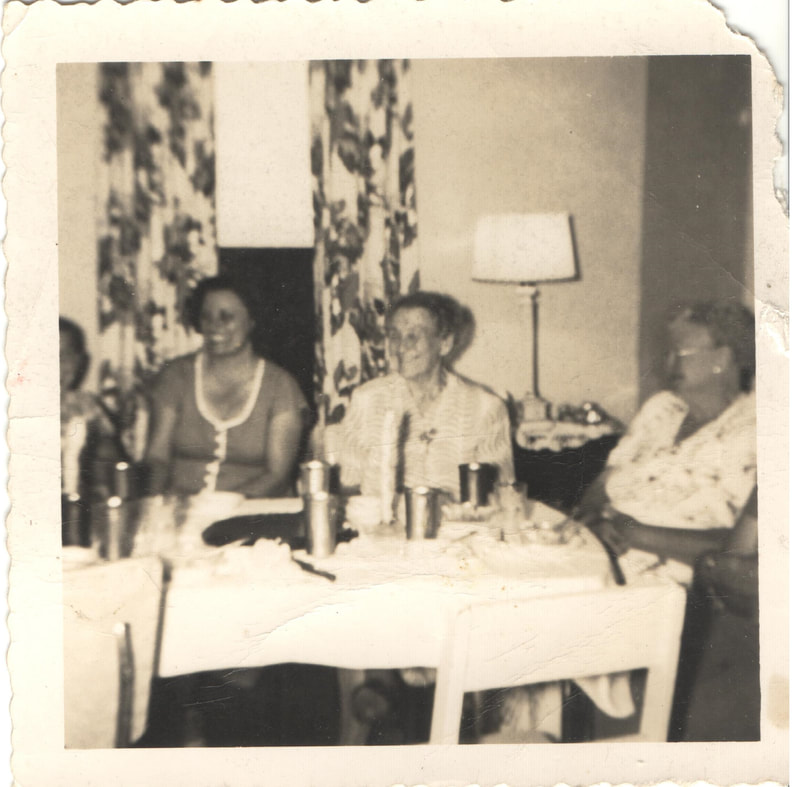 Women gathered at dinner table