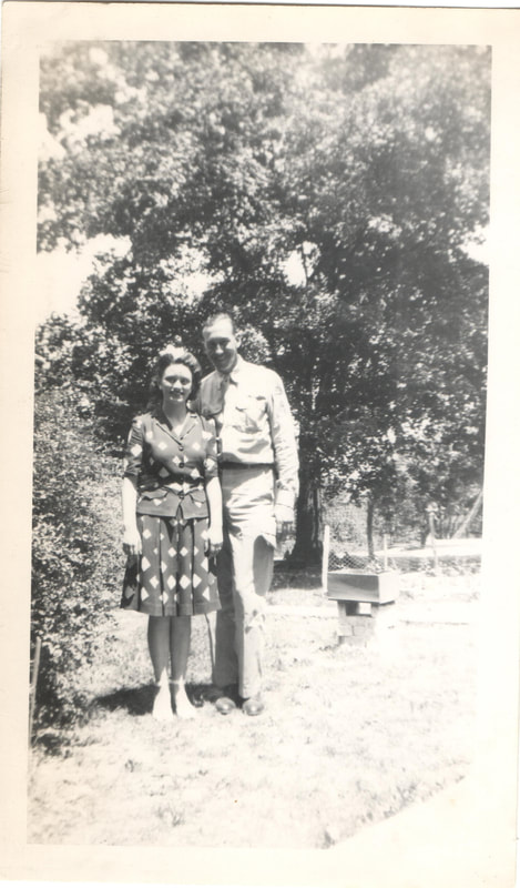 Man and woman standing together outdoors