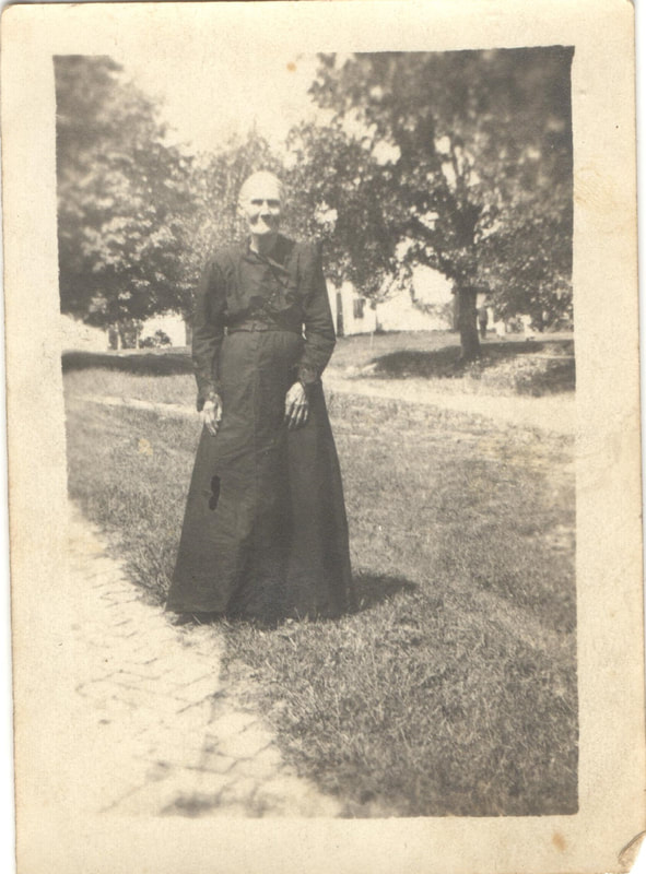 Elderly woman in  black dress