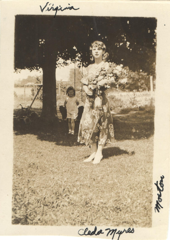 Young woman holding flowers outdoors