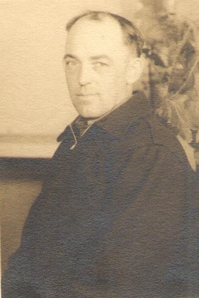 Man In Jacket Seated