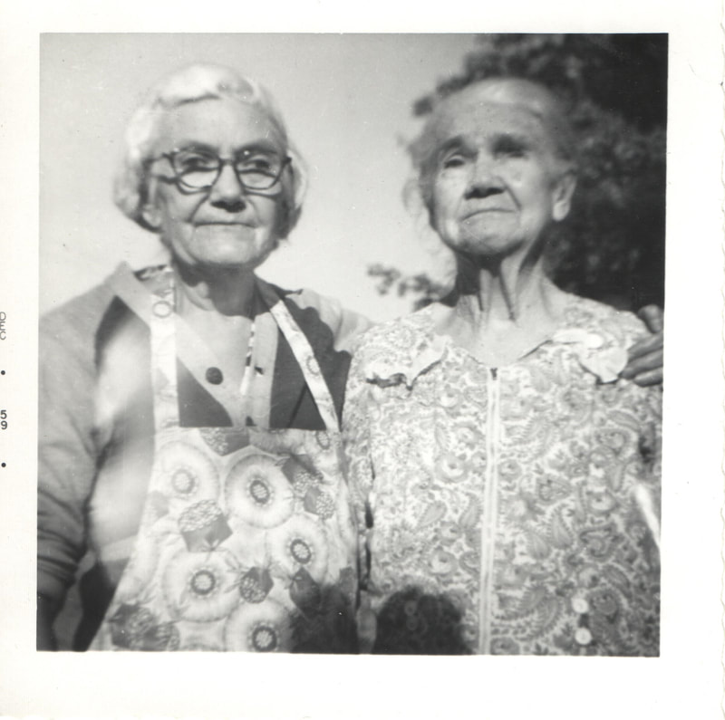 Elderly women standing together
